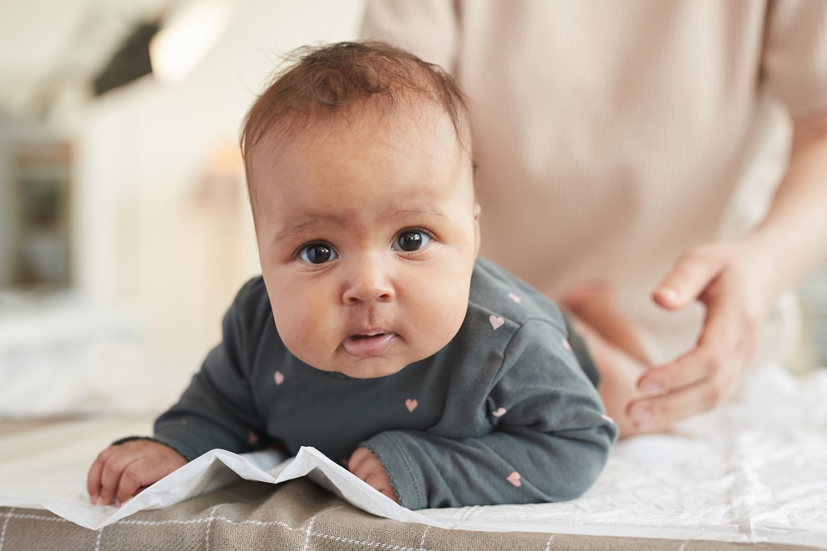 cute baby on changing table