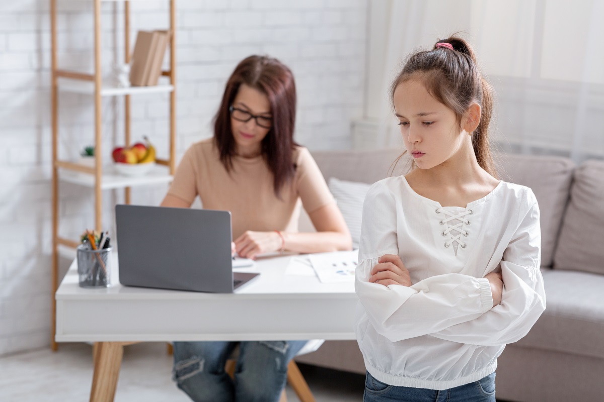 upset teen girl taking offence at her busy working mother during covid 19 lockdown, copy space