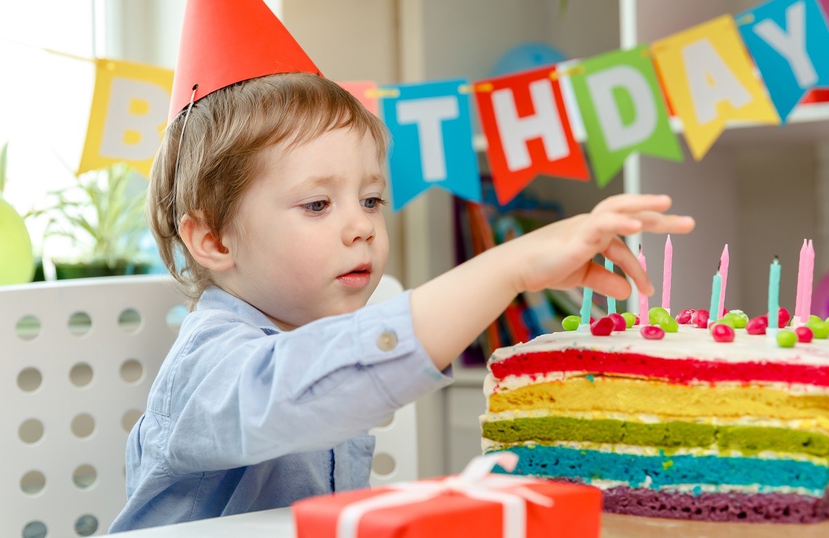 a child eats a birthday cake birthday party and w 2022 02 22 05 24 06 utc